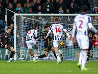 Number 18, Karlan Grant of WBA attempts a shot on goal as half-time approaches during the Sky Bet Championship match between West Bromwich A...