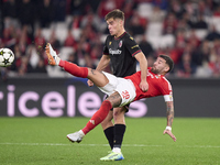 Nicolas Otamendi of SL Benfica competes for the ball with Thijs Dallinga of Bologna Football Club 1909 during the UEFA Champions League matc...