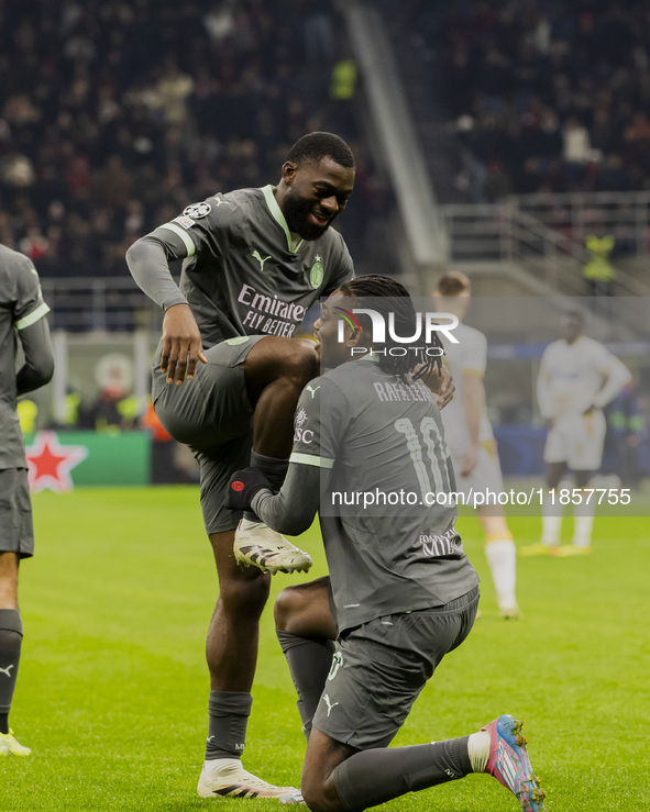 Rafael Leao and Fikayo Tomori celebrate the goal during the UEFA Champions League 2024/25 match between AC Milan and FK Crvena Zvezda in Mil...