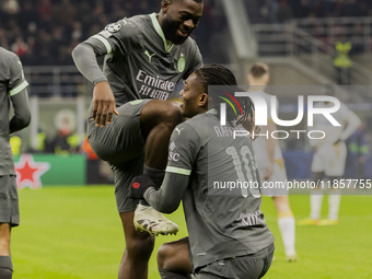 Rafael Leao and Fikayo Tomori celebrate the goal during the UEFA Champions League 2024/25 match between AC Milan and FK Crvena Zvezda in Mil...