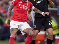 Nicolas Otamendi of SL Benfica competes for the ball with Thijs Dallinga of Bologna Football Club 1909 during the UEFA Champions League matc...