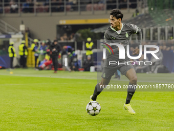 Tijjani Reijnders plays during the UEFA Champions League 2024/25 match between AC Milan and FK Crvena Zvezda at Giuseppe Meazza stadium in M...