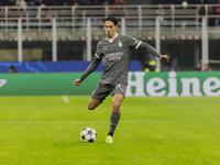 Tijjani Reijnders plays during the UEFA Champions League 2024/25 match between AC Milan and FK Crvena Zvezda at Giuseppe Meazza stadium in M...