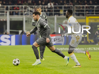 Theo Hernandez plays during the UEFA Champions League 2024/25 match between AC Milan and FK Crvena Zvezda at Giuseppe Meazza stadium in Mila...