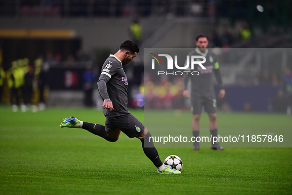 Theo Hernandez of AC Milan is in action during the UEFA Champions League match between AC Milan and FK Crvena Zvezda at Giuseppe Meazza in M...