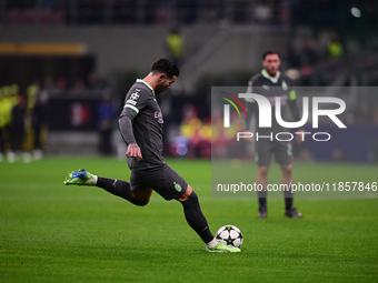 Theo Hernandez of AC Milan is in action during the UEFA Champions League match between AC Milan and FK Crvena Zvezda at Giuseppe Meazza in M...