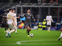 Tjjani Reijnders of AC Milan is in action during the UEFA Champions League match between AC Milan and FK Crvena Zvezda at Giuseppe Meazza in...