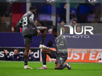 Rafael Leao of AC Milan celebrates after scoring his team's first goal during the UEFA Champions League match between AC Milan and FK Crvena...