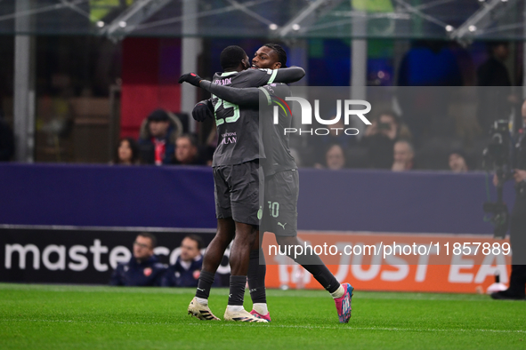 Rafael Leao of AC Milan celebrates after scoring his team's first goal during the UEFA Champions League match between AC Milan and FK Crvena...