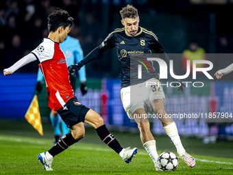 Feyenoord Rotterdam midfielder Inbeom Hwang and Sparta Praha defender Matej Rynes play during the match between Feyenoord and Sparta Praha a...