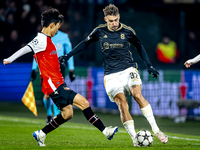 Feyenoord Rotterdam midfielder Inbeom Hwang and Sparta Praha defender Matej Rynes play during the match between Feyenoord and Sparta Praha a...