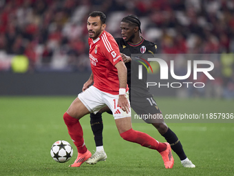 Samuel Iling-Junior of Bologna Football Club 1909 competes for the ball with Vangelis Pavlidis of SL Benfica during the UEFA Champions Leagu...