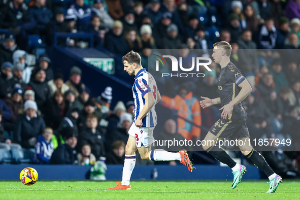 Jayson Molumby of WBA, number 8, is chased by Ben Sheaf of Coventry, number 14, during the Sky Bet Championship match between West Bromwich...