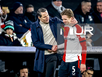 Feyenoord Rotterdam trainer Brian Priske and Feyenoord Rotterdam defender Gijs Smal are present during the match between Feyenoord and Spart...