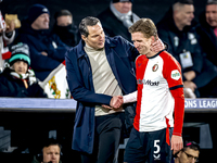 Feyenoord Rotterdam trainer Brian Priske and Feyenoord Rotterdam defender Gijs Smal are present during the match between Feyenoord and Spart...