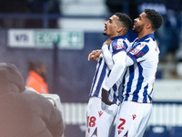 #18, Karlan Grant of WBA is congratulated for his goal by #2, Darnell Furlong during the Sky Bet Championship match between West Bromwich Al...