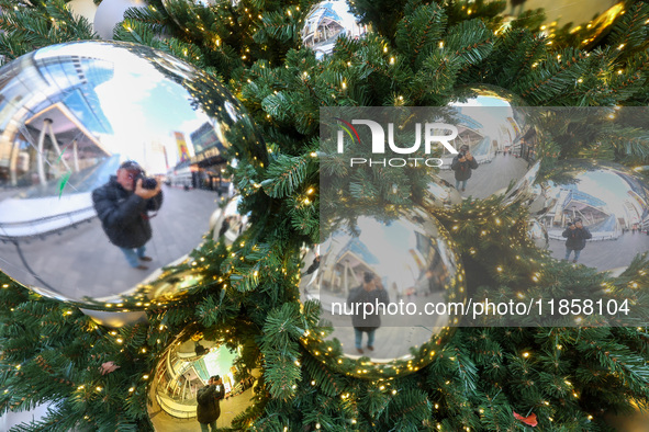 The Christmas tree stands in the plaza outside Madison Square Garden and Penn Station in New York, N.Y., on December 6, 2024. 