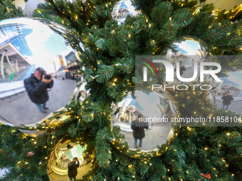 The Christmas tree stands in the plaza outside Madison Square Garden and Penn Station in New York, N.Y., on December 6, 2024. (