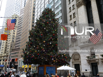 The Christmas tree stands on Broad Street outside the New York Stock Exchange in New York, N.Y., on December 8, 2024. (