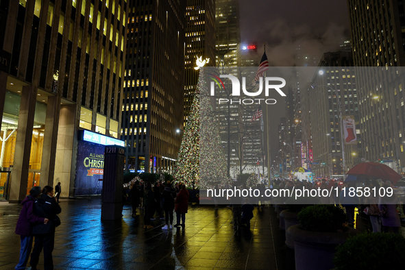 The Christmas tree stands outside the News Corporation building in New York, N.Y., on December 10, 2024. 