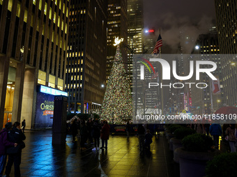 The Christmas tree stands outside the News Corporation building in New York, N.Y., on December 10, 2024. (