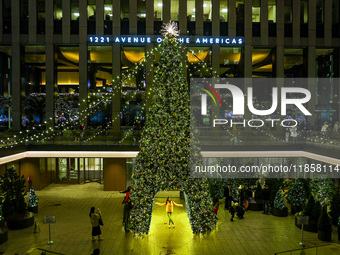 The Christmas tree stands outside of 1221 Avenue of the Americas near Rockefeller Center in New York, N.Y., on December 10, 2024. (