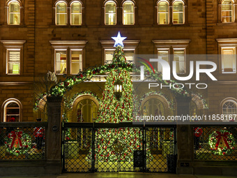 The Christmas tree stands in the courtyard of the Lotte New York Palace in New York, N.Y., on December 10, 2024. (