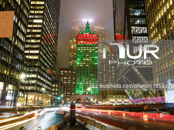 The Helmsley Building and Park Avenue are decorated in colorful lights for holidays in New York, N.Y., on December 10, 2024. The photo is ta...