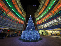 The Christmas tree stands outside the Bloomberg Tower on Beacon Court in New York, N.Y., on December 8, 2024. (