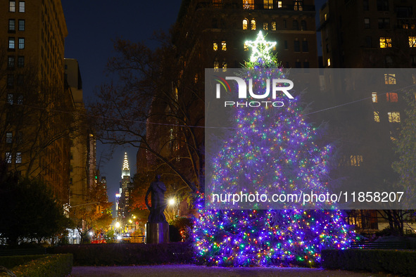 The Christmas tree in Gramercy Park with the Chrysler Building in the background is in New York, N.Y., on December 8, 2024. 