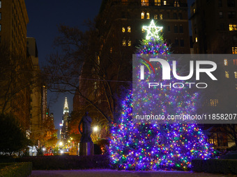 The Christmas tree in Gramercy Park with the Chrysler Building in the background is in New York, N.Y., on December 8, 2024. (