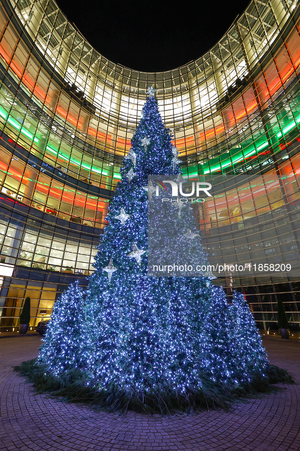 The Christmas tree stands outside the Bloomberg Tower on Beacon Court in New York, N.Y., on December 8, 2024. 