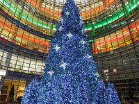 The Christmas tree stands outside the Bloomberg Tower on Beacon Court in New York, N.Y., on December 8, 2024. (