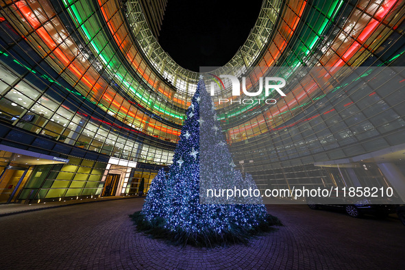 The Christmas tree stands outside the Bloomberg Tower on Beacon Court in New York, N.Y., on December 8, 2024. 