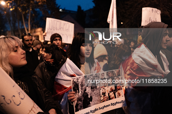 Georgia pro-Europe marchers protest against the government's postponement of European Union accession talks until 2028, outside the Parliame...