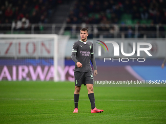 Francesco Camarda of AC Milan looks on during the UEFA Champions League match between AC Milan and FK Crvena Zvezda at Giuseppe Meazza in Mi...