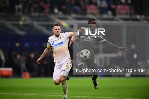 Yunus Musah of AC Milan is in action during the UEFA Champions League match between AC Milan and FK Crvena Zvezda at Giuseppe Meazza in Mila...