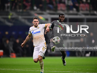 Yunus Musah of AC Milan is in action during the UEFA Champions League match between AC Milan and FK Crvena Zvezda at Giuseppe Meazza in Mila...