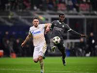 Yunus Musah of AC Milan is in action during the UEFA Champions League match between AC Milan and FK Crvena Zvezda at Giuseppe Meazza in Mila...