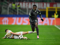 Rafael Leao of AC Milan is in action during the UEFA Champions League match between AC Milan and FK Crvena Zvezda at Giuseppe Meazza in Mila...