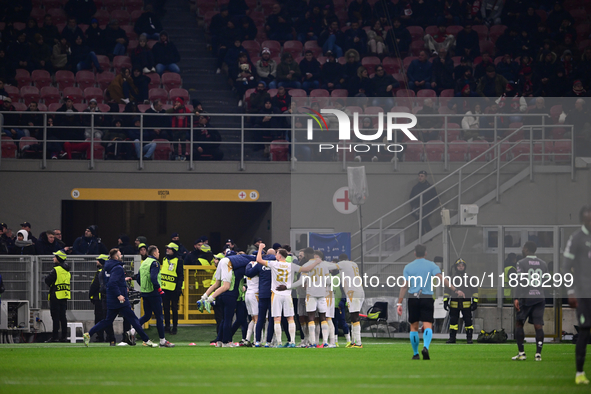 Nemanja Radonjic of FK Crvena Zvezda celebrates after scoring his team's first goal during the UEFA Champions League match between AC Milan...