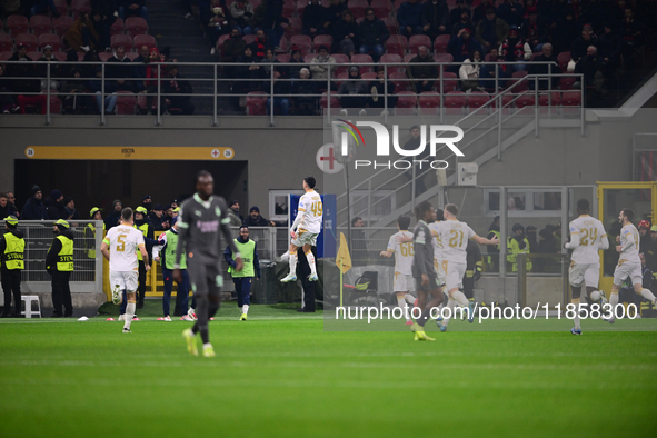 Nemanja Radonjic of FK Crvena Zvezda celebrates after scoring his team's first goal during the UEFA Champions League match between AC Milan...