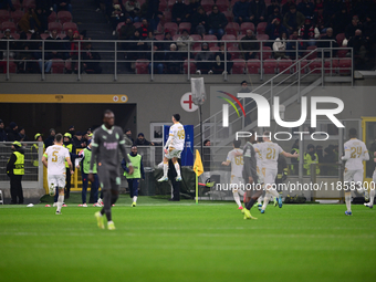 Nemanja Radonjic of FK Crvena Zvezda celebrates after scoring his team's first goal during the UEFA Champions League match between AC Milan...