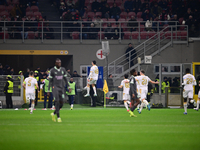 Nemanja Radonjic of FK Crvena Zvezda celebrates after scoring his team's first goal during the UEFA Champions League match between AC Milan...