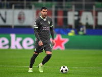 Theo Hernandez of AC Milan is in action during the UEFA Champions League match between AC Milan and FK Crvena Zvezda at Giuseppe Meazza in M...