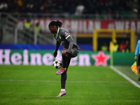 Rafael Leao of AC Milan is in action during the UEFA Champions League match between AC Milan and FK Crvena Zvezda at Giuseppe Meazza in Mila...