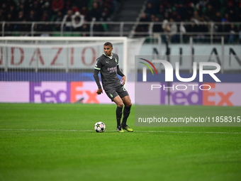 Malick Thiaw of AC Milan is in action during the UEFA Champions League match between AC Milan and FK Crvena Zvezda at Giuseppe Meazza in Mil...