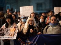 Protesters demonstrate against the government's postponement of European Union accession talks until 2028 outside the Parliament in central...