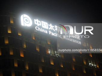 The office building of China Pacific Insurance, a leader in China's semiconductor industry, is seen in Shanghai, China, on December 8, 2024....