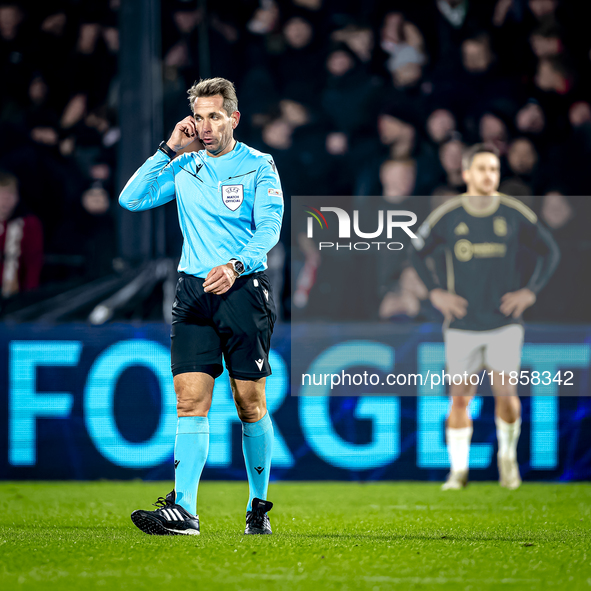 Referee Tobias Stieler officiates during the match between Feyenoord and Sparta Praha at Stadium De Kuip for the Champions League - League p...